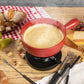 KUHN RIKON Käsefondue Set Classic Rot· Ø 23 Cm, 2.6 Liter Inhalt, Ideal Für 4-6 Personen, Set Enthält 6 Gabeln, Einen Pastenbrenner (Ohne Brennpaste), Und Ein Rechaud